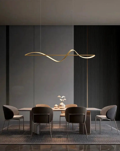 Chandelier Modern gold curved LED dining pendant light Decorbites over a six-seat dining table on Tampa Home & Garden Store