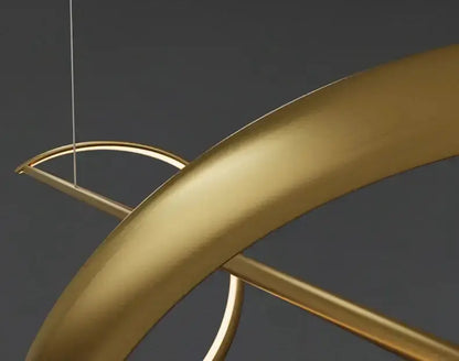 Chandelier Decorbites modern gold curved LED dining pendant light with circular rings on Tampa Home & Garden Store