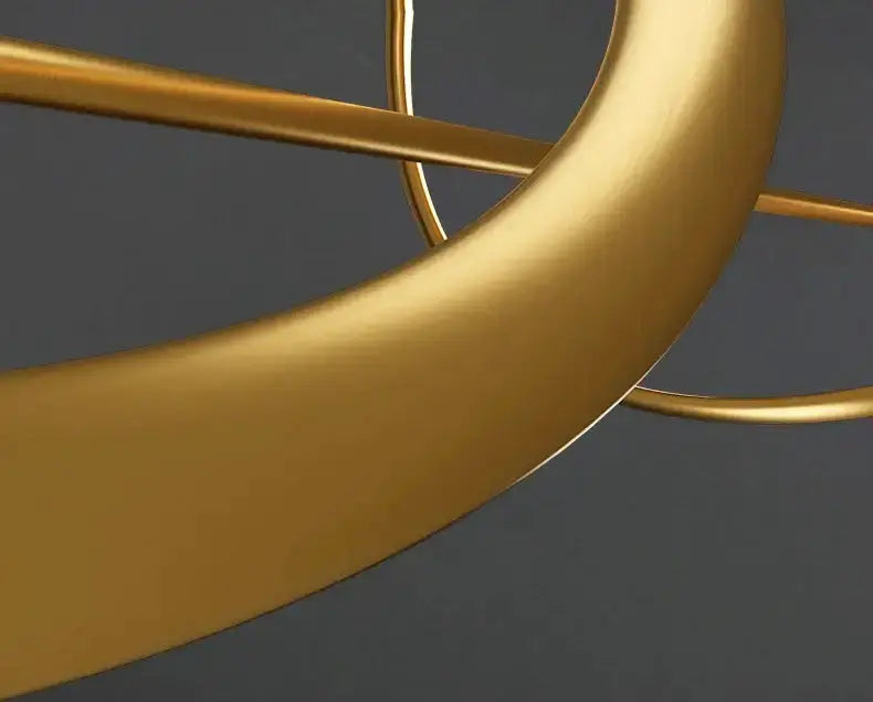 Chandelier Decorbites modern gold curved LED pendant light with circular rings on Tampa Home & Garden Store