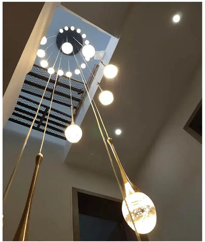 Chandelier Decorbites modern gold LED crystal cascade pendant with glass globe drops on Tampa Home & Garden Store
