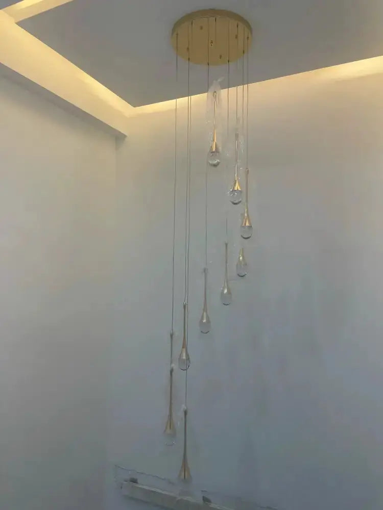 Chandelier Decorbites modern gold LED crystal cascading pendant for dining room on Tampa Home & Garden Store