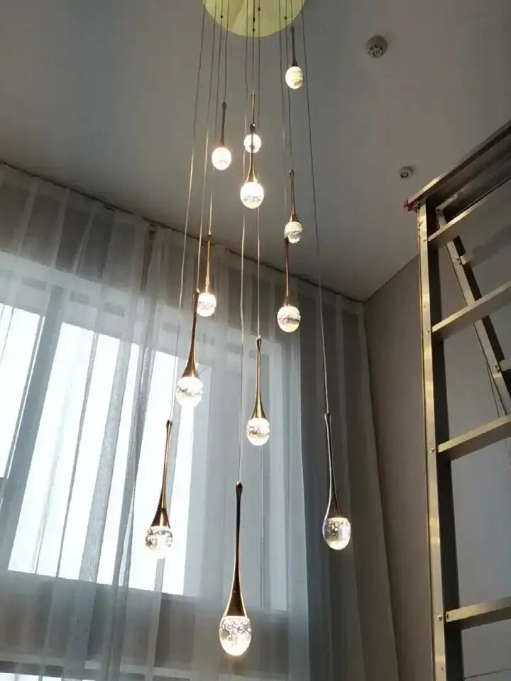 Chandelier Decorbites modern gold LED crystal cascading pendant lights for dining room on Tampa Home & Garden Store