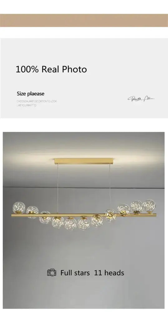 Modern gold linear LED glass chandelier with 11 glass globes for dining room on Tampa Home & Garden Store