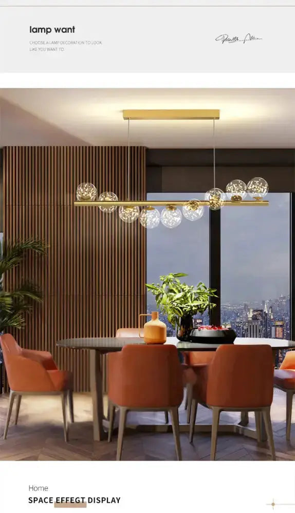 Decorbites modern gold linear LED glass chandelier over a dining table with orange chairs on Tampa Home & Garden Store