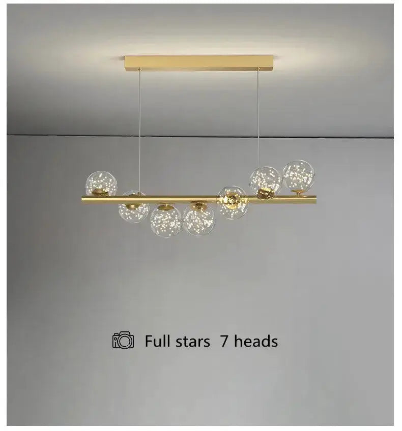 Modern gold linear LED glass chandelier dining room pendant light with seven glass globes on Tampa Home & Garden Store