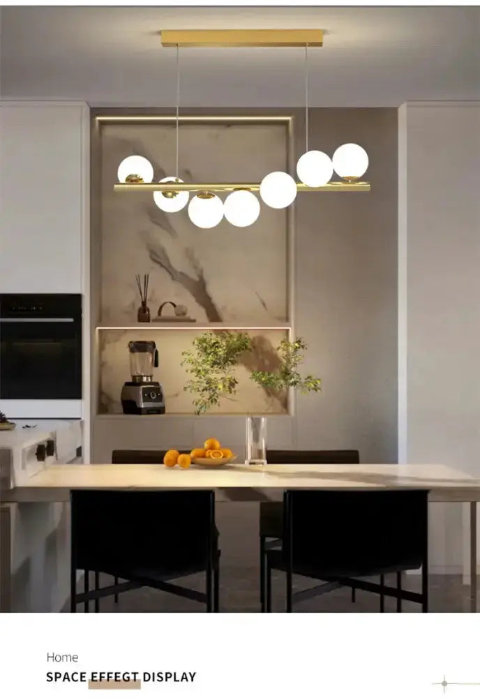 Chandelier Decorbites modern gold linear LED glass pendant with globe bulbs over dining table on Tampa Home & Garden Store