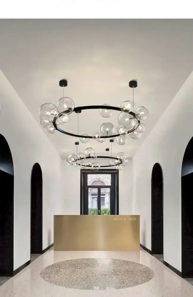 Chandelier Decorbites modern black circular ring LED with clear glass bubble globes on Tampa Home & Garden Store