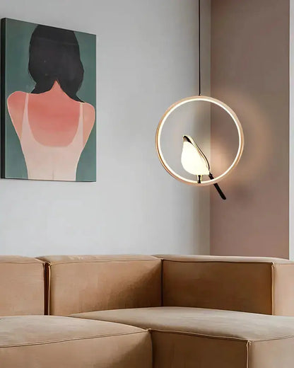 Modern gold magpie bird LED pendant light with circular geometric ring Decorbites on Tampa Home & Garden Store