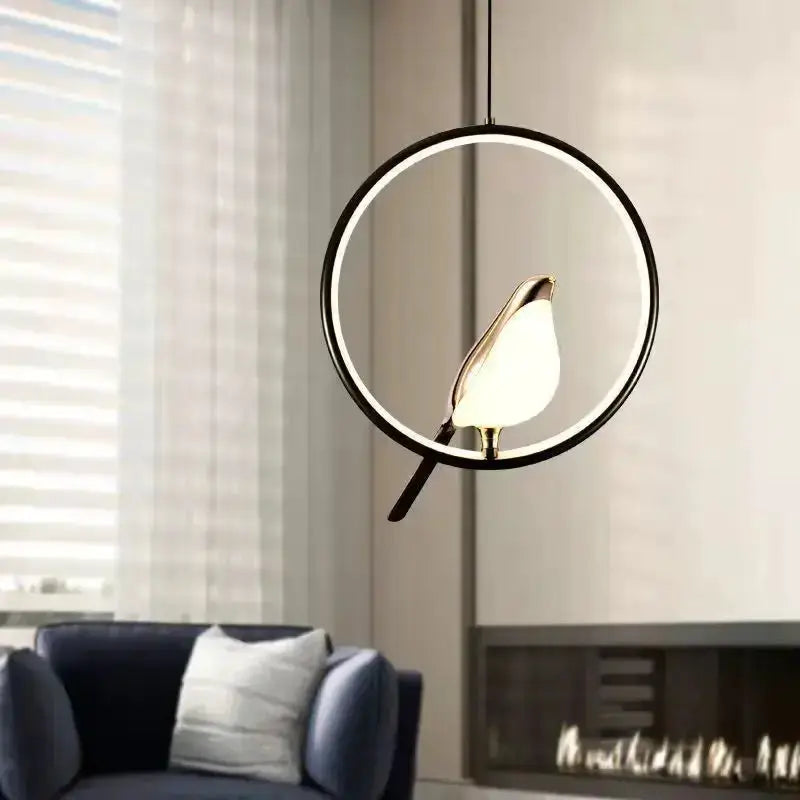 Modern gold magpie bird LED pendant light with circular geometric frame Decorbites on Tampa Home & Garden Store