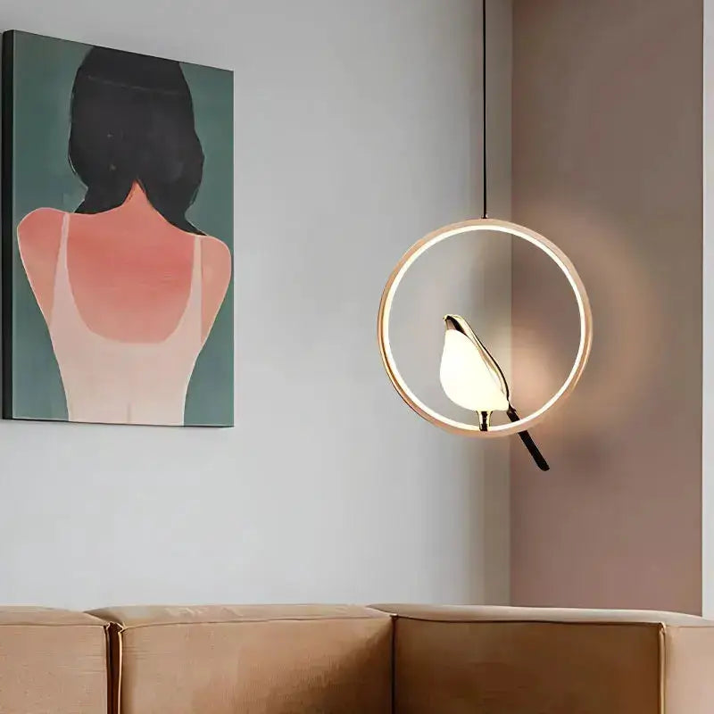 Pendant light Decorbites modern gold magpie bird LED with circular geometric ring frame on Tampa Home & Garden Store