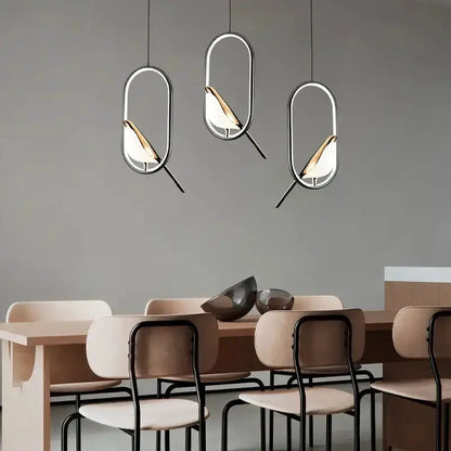 Set of 3 modern gold magpie bird LED pendant lights with geometric oval frames Decorbites on Tampa Home & Garden Store