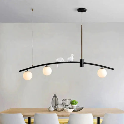 Decorbites modern black brass pendant light with milk glass birds, curved bar, 3 globes on Tampa Home & Garden Store