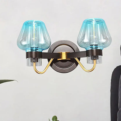 Blue Glass Mushroom Sconce duo by Decorbites with black mount and brass arms teal glass shades on Tampa Home & Garden Store