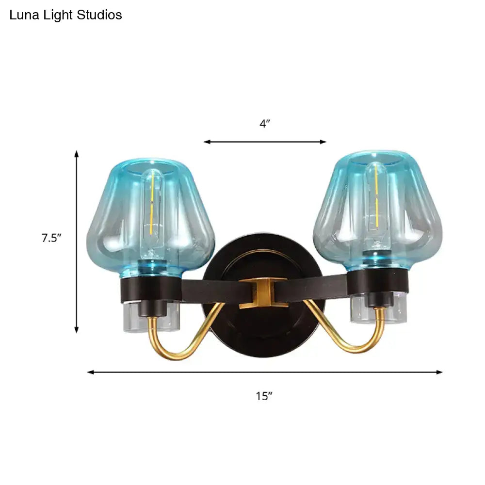 Blue glass mushroom sconce by Decorbites, two-light wall fixture with brass arms on Tampa Home & Garden Store