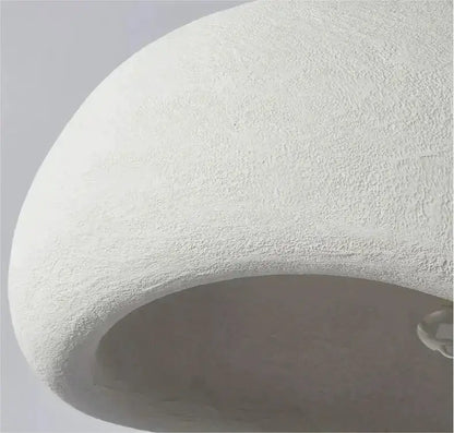 Modern gray dome pendant light by Decorbites with textured exterior and warm interior glow on Tampa Home & Garden Store
