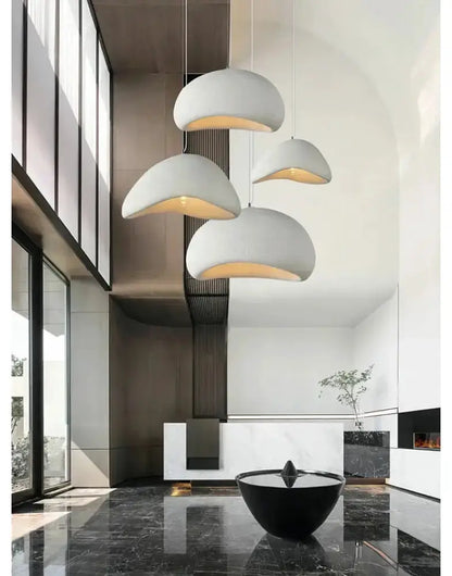 Decorbites modern gray and yellow dome pendant lights, set of 4 with warm dining room glow on Tampa Home & Garden Store