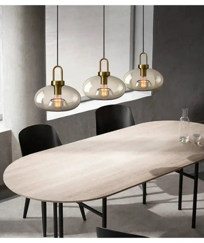Pendant light set smoked glass and brass, 3 globes over a dining table Decorbites on Tampa Home & Garden Store