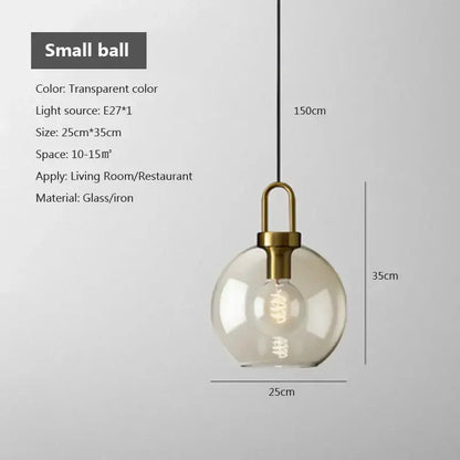 Pendant light smoked glass globe with brass hardware by Decorbites on Tampa Home & Garden Store