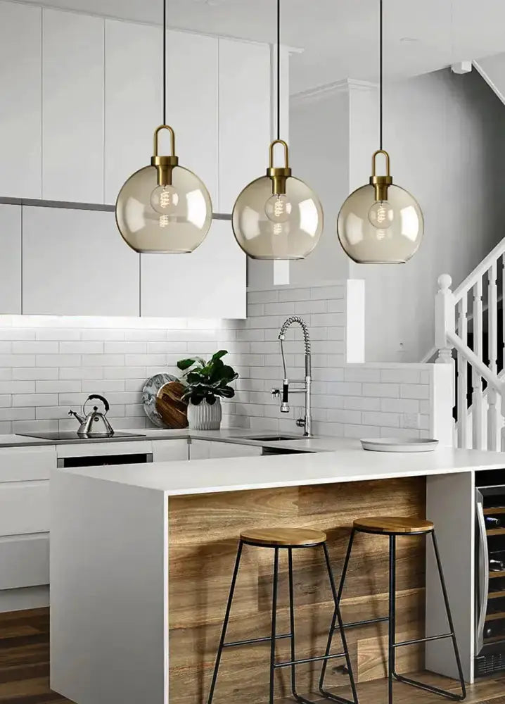 Modern smoked glass and brass pendant light set, three fixtures over kitchen island Decorbites on Tampa Home & Garden Store