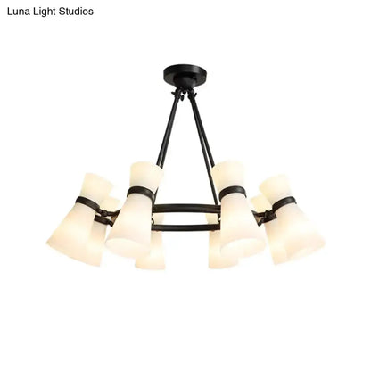 Modern black wide-flare pendant chandelier with eight frosted glass bell shades for dining on Tampa Home & Garden Store