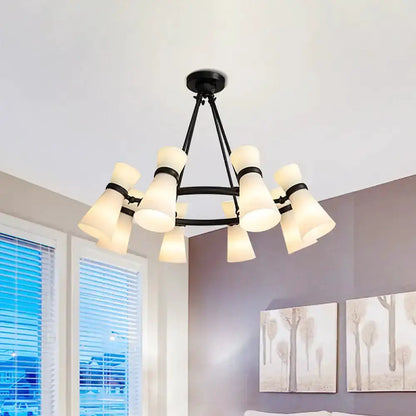 Modern black metal chandelier with a wide circular ring and frosted glass bell shades on Tampa Home & Garden Store