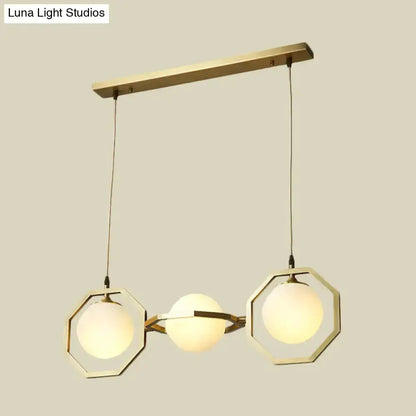 Modern gold octagon frosted glass orb pendant light for kitchen island by Decorbites on Tampa Home & Garden Store