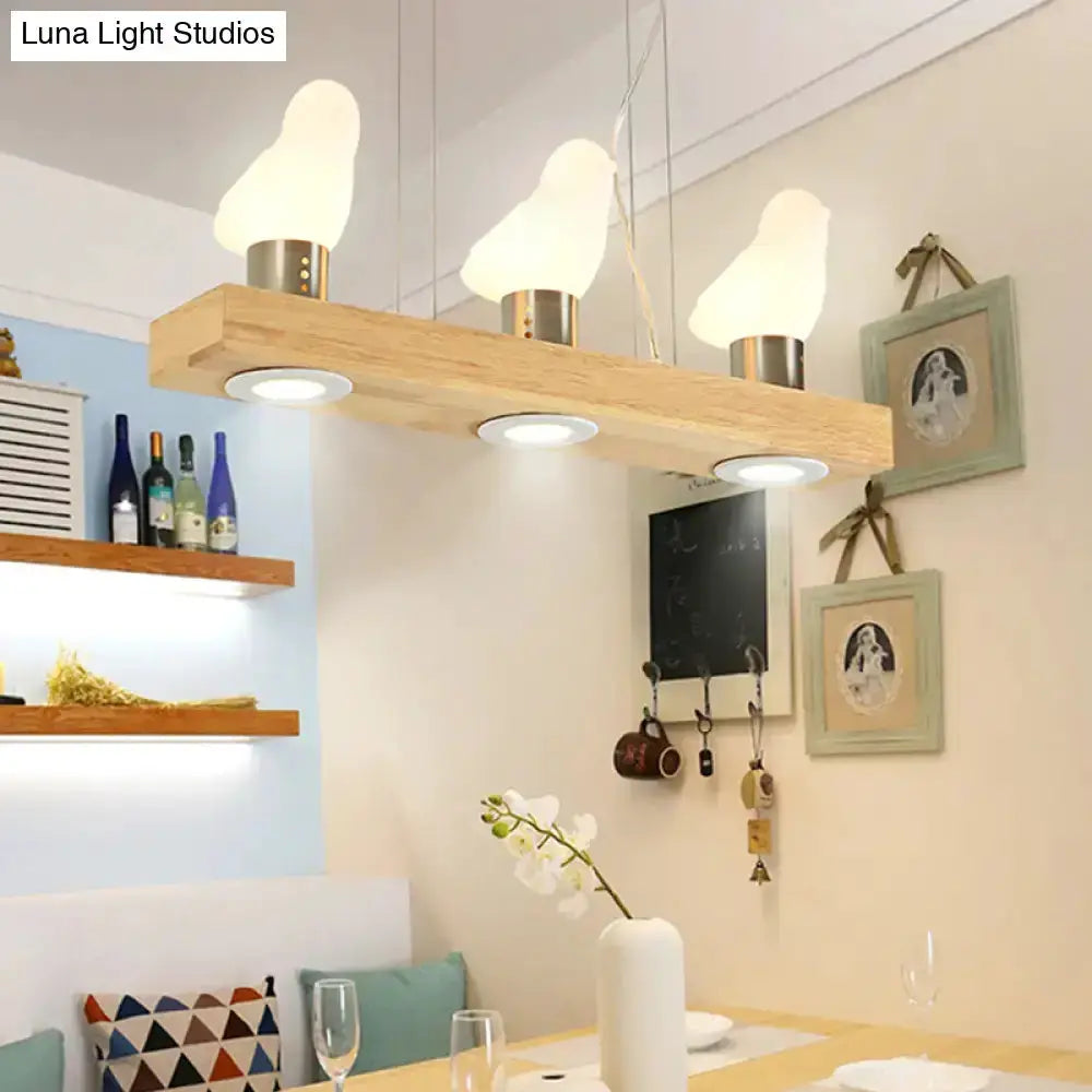 Modern wood and white glass island pendant light, 3-light fixture with wood beam shades on Tampa Home & Garden Store