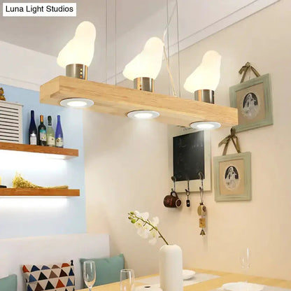 Modern wood and white glass island pendant light, 3-light fixture with wood beam shades on Tampa Home & Garden Store