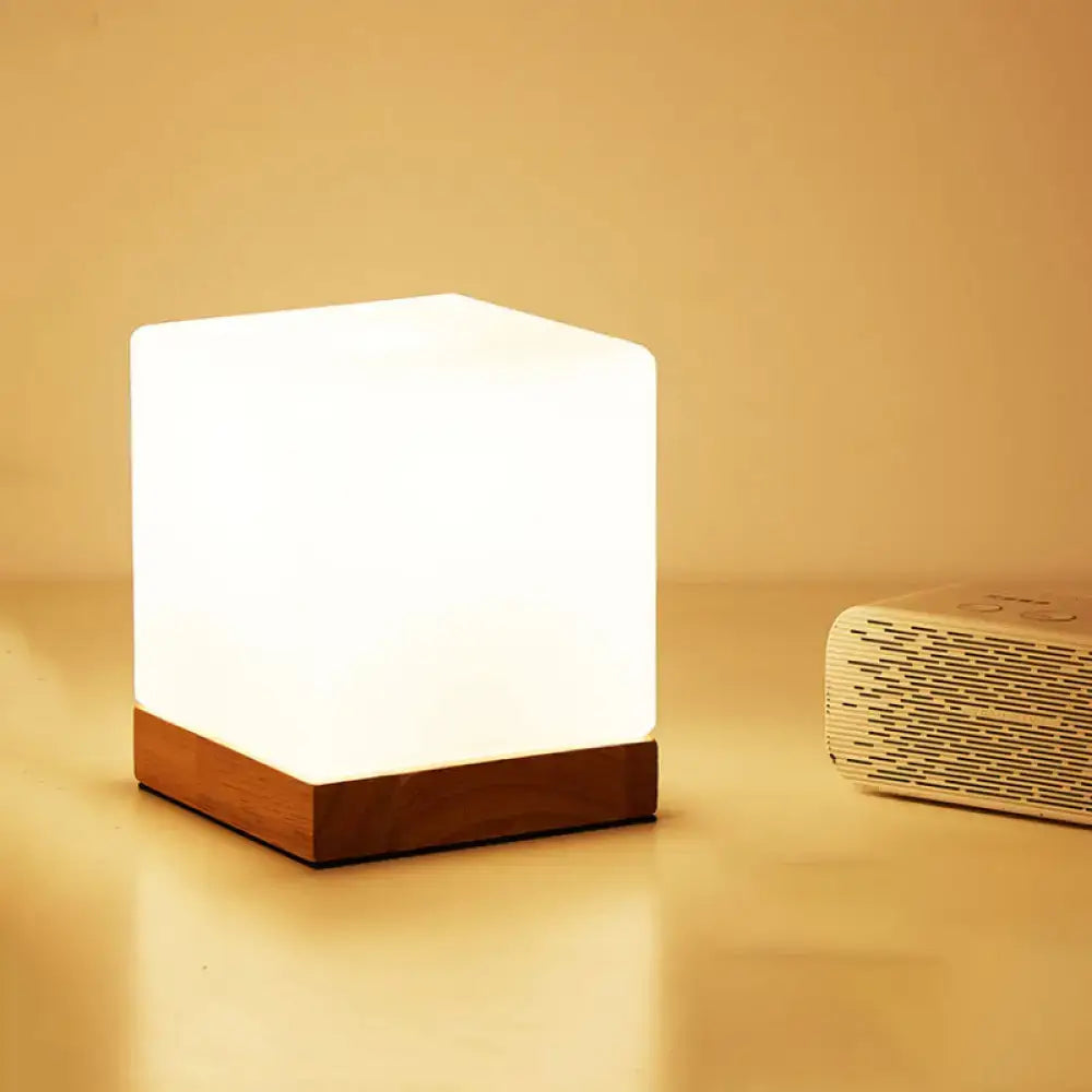 White glass cube nightlight with wooden base, Decorbites, warm glow on Tampa Home & Garden Store