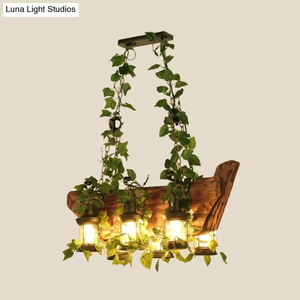 Industrial ivy pendant light by Decorbites with green hanging vines and lantern bulbs on Tampa Home & Garden Store