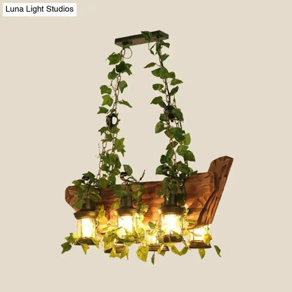 Industrial ivy pendant light by Decorbites with green hanging vines and lantern bulbs on Tampa Home & Garden Store