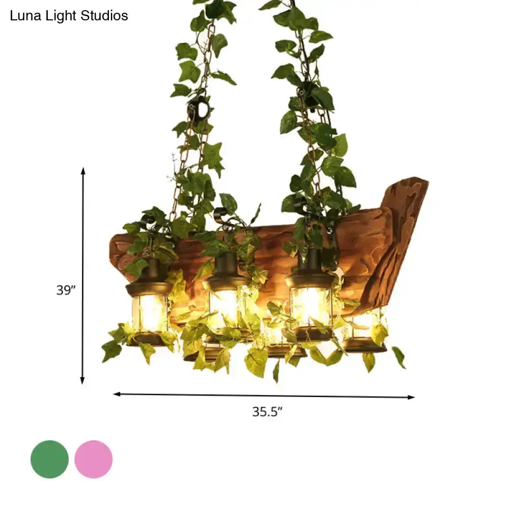 Industrial ivy pendant light with pink & green foliage and three lantern bulbs, warm glow on Tampa Home & Garden Store