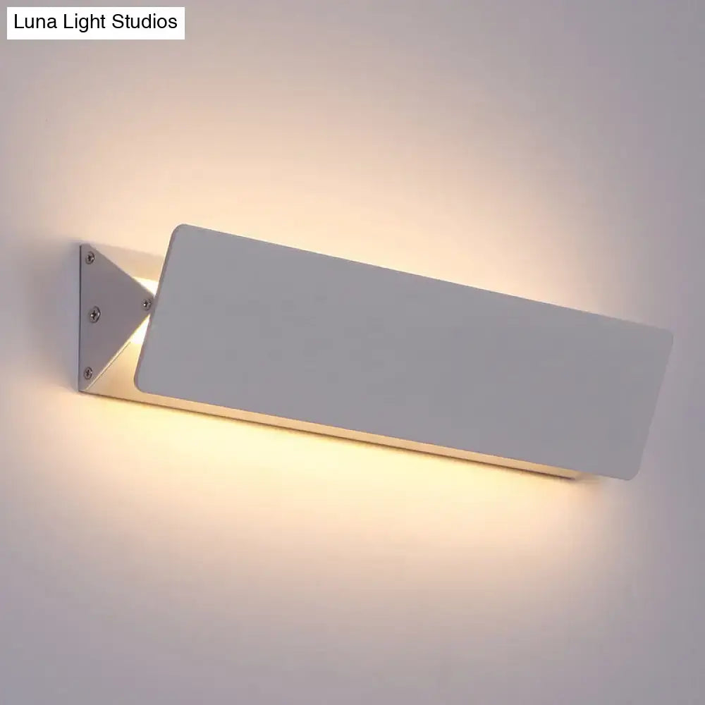 White linear LED sconce, white metal wall mount by Decorbites, warm ambient glow on Tampa Home & Garden Store