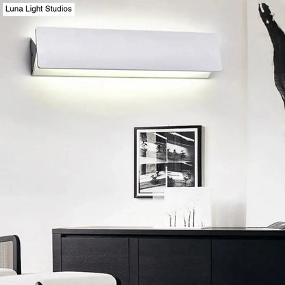 White linear LED sconce by Decorbites, wall-mounted with white metal housing on Tampa Home & Garden Store