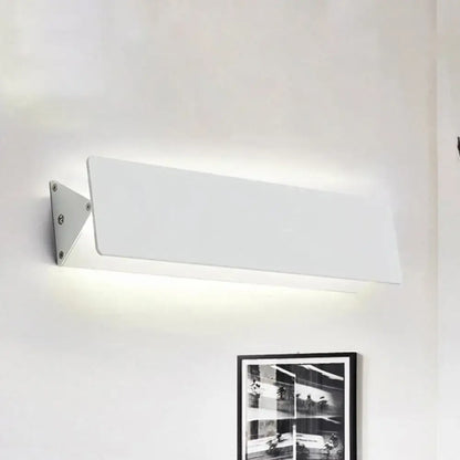Decorbites White Linear LED Sconce, wall-mounted with angled metal bracket on Tampa Home & Garden Store