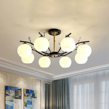 Semi-flush dining light Decorbites with black gold finish and frosted globes on Tampa Home & Garden Store