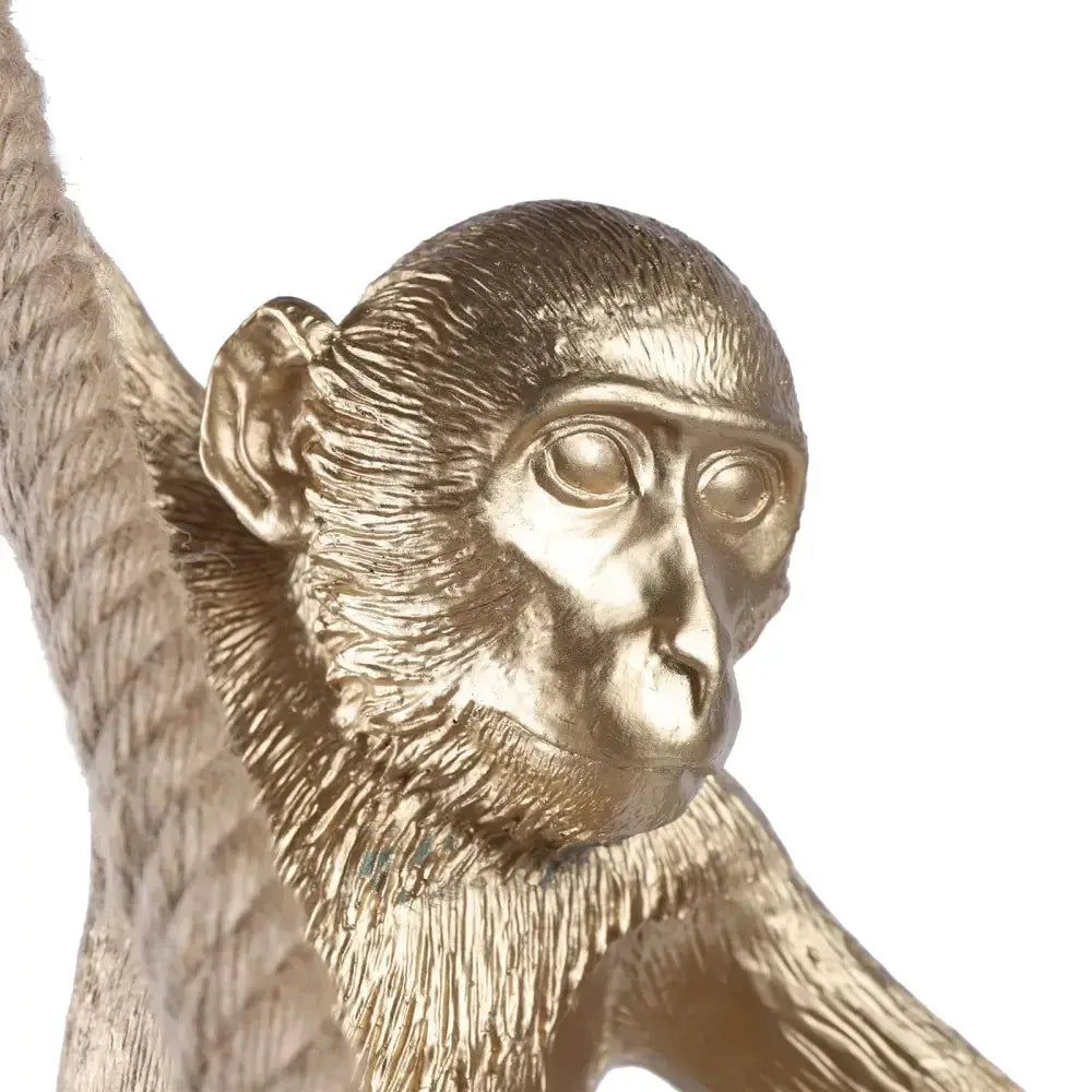 Gold monkey pendant lamp with hemp rope details for living room decor on Tampa Home & Garden Store
