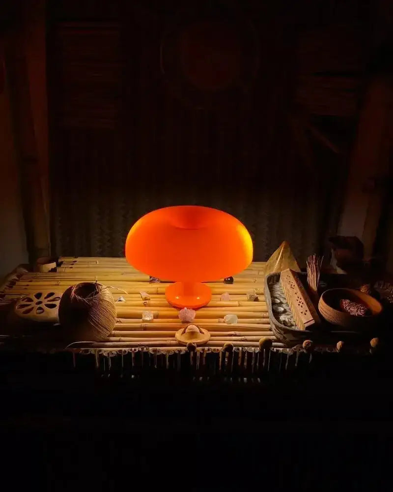 Black LED Mushroom Lamp by Decorbites with warm orange glow on bedside table on Tampa Home & Garden Store