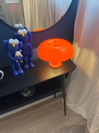 Black LED Mushroom Lamp bedside table lamp by Decorbites with orange glow; two blue plush monkeys on Tampa Home & Garden Store
