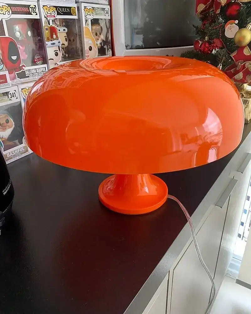 Orange LED mushroom bedside table lamp with visible power cord on a dark surface on Tampa Home & Garden Store