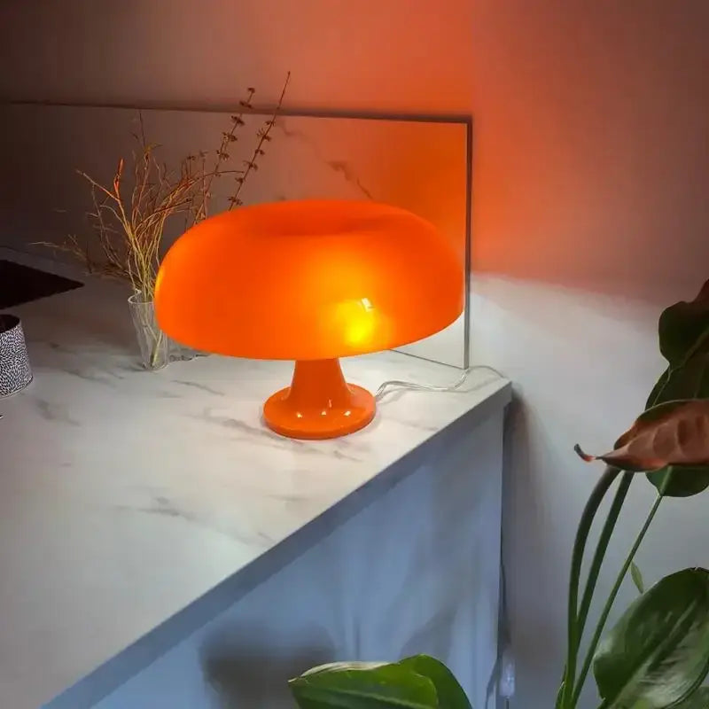 Orange mushroom LED table lamp by Decorbites on marble bedside surface on Tampa Home & Garden Store