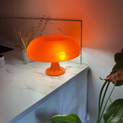 Orange mushroom LED table lamp by Decorbites on marble bedside surface on Tampa Home & Garden Store