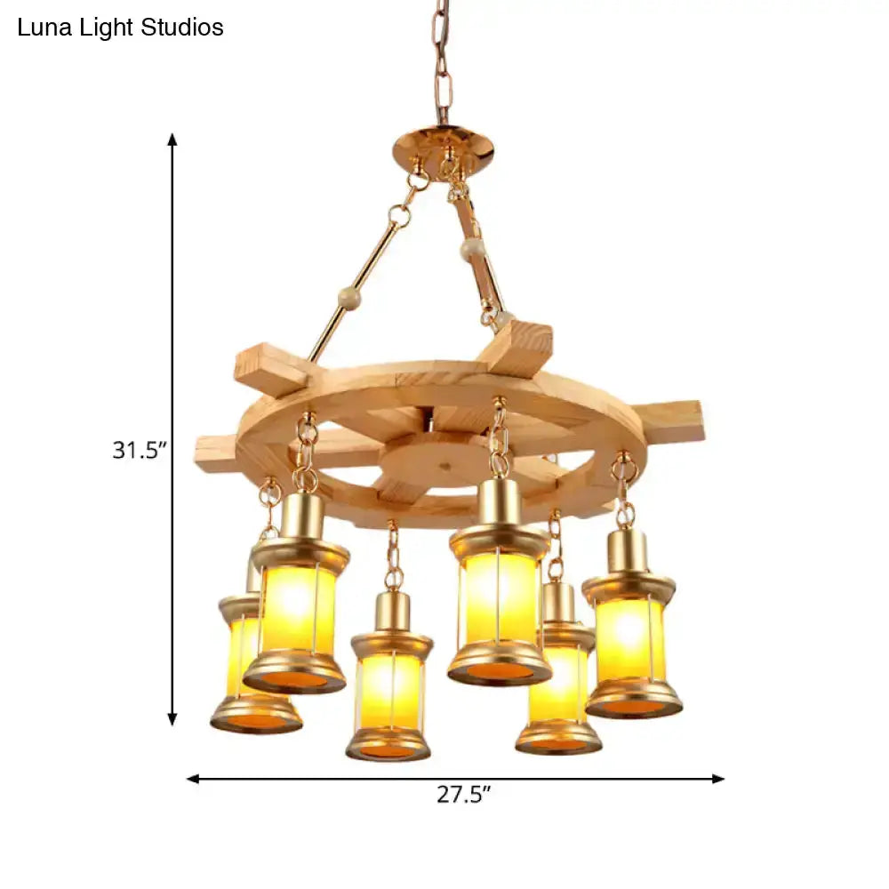 Rustic industrial wood spool chandelier with 6 amber glass lanterns, brass Decorbites on Tampa Home & Garden Store