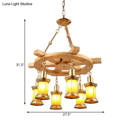 Rustic industrial wood spool chandelier with six amber glass lanterns brass accents Decorbites on Tampa Home & Garden Store