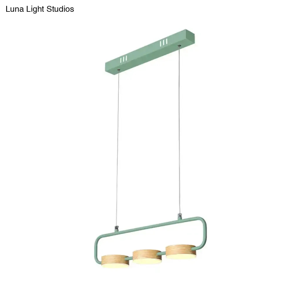 Modern mint green pendant light with wood accents for kitchen island three-light design on Tampa Home & Garden Store