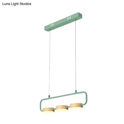 Modern mint green pendant light with wood accents for kitchen island three-light design on Tampa Home & Garden Store