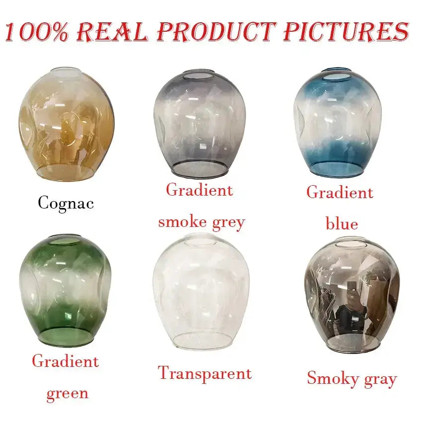 Six amber glass globe chandelier pendants in cognac, gradient blue/grey, green and transparent on Tampa Home & Garden Store