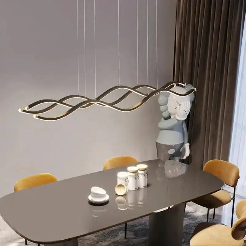 Chandelier gold wave LED pendant light by Decorbites, gold wave frame over dining table on Tampa Home & Garden Store