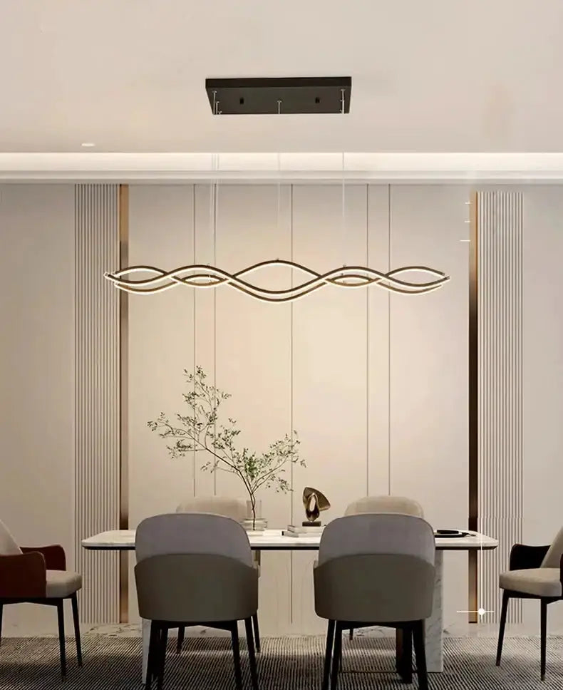 Modern curved LED pendant chandelier by Decorbites for dining room, gold wave design on Tampa Home & Garden Store