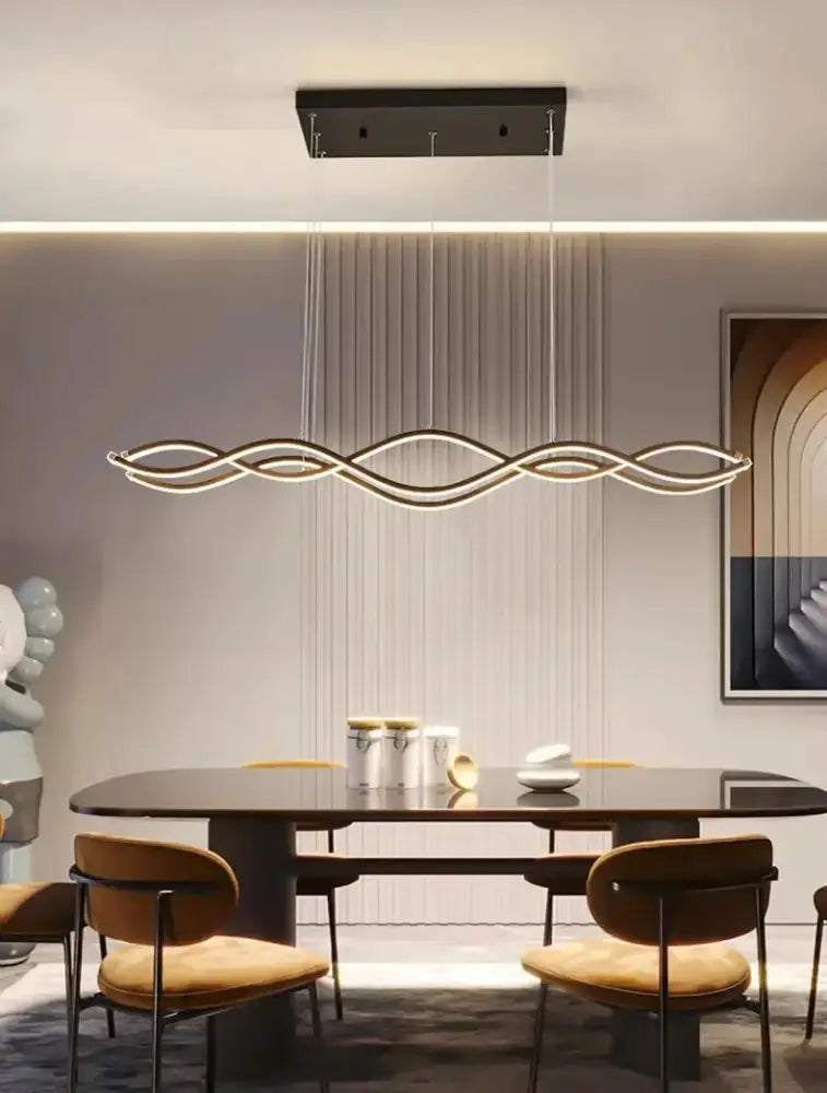 Modern curved LED pendant light chandelier by Decorbites, gold-tone wave fixture for dining on Tampa Home & Garden Store